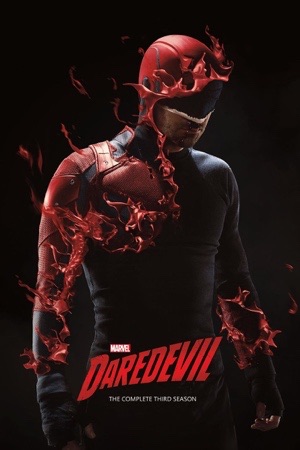 Daredevil in the black suit, seen through falling red streaks.