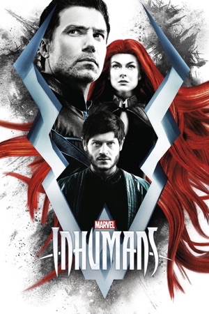 The royal family in white and red, Medusa's red hair spreading across the frame like wings.