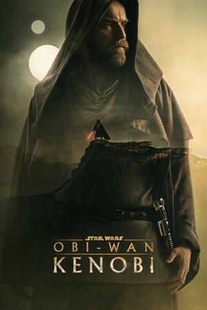 Ewan McGregor in a hood, seen from behind, walking away across a pale desert.